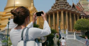 Woman take photo at Thailand temple
